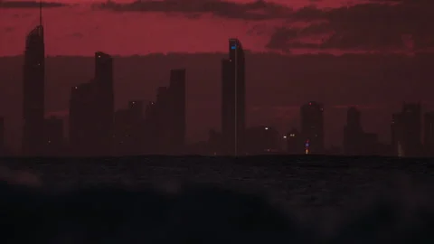 Cityscape off the Coast at dusk Stock Footage 264147372