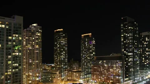 CITYSCAPE CondoLightsAtNight Stock Footage 7733289