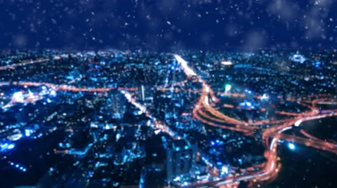 Cityscape, defocused lights night wintry city and snowfall, Seamless loop. Stock Footage 67629200