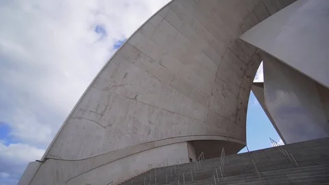 Cityscape - design of a modern opera building. Beautiful wave facade Auditorio Stock Footage 116133491