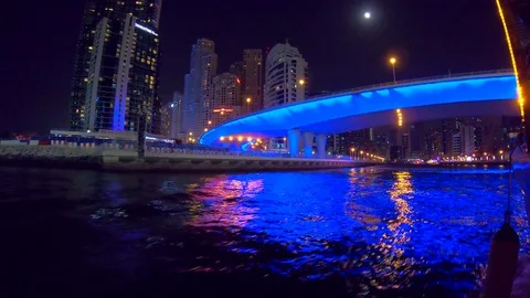 Cityscape from dubai marina by night, boat trip, skyscrapers, fascinating city Stock Footage 83431453