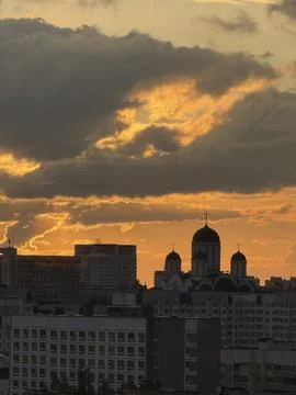 A cityscape during sunset, with multiple mid-rise resident Foto stock