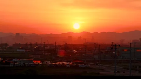 Cityscape dyed in the setting sun Stock Footage 243987037