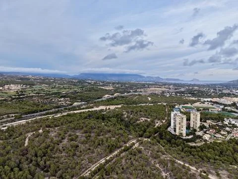 Cityscape from elevated drone footage, panoramic aerial view of city and Stock Photos