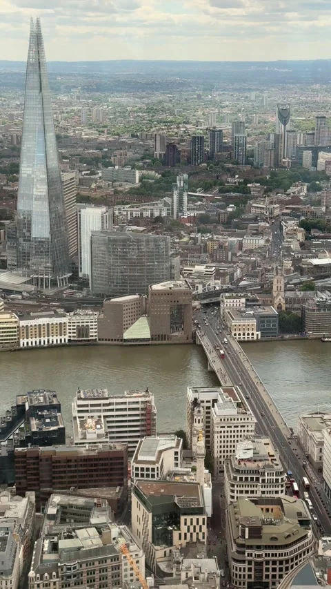 Cityscape featuring bridge traffic and The Shard in London Stock Footage 340529792