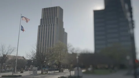 Cityscape with Flags Waving in the Wind HD Video Stock Footage 91002747