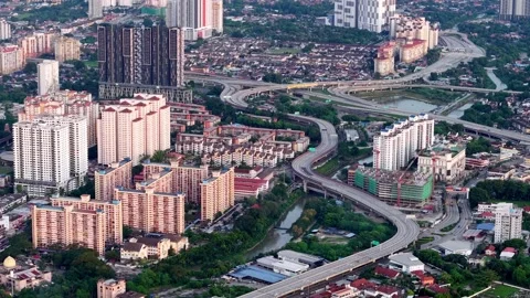 Cityscape with a freeway running through it aerial view 動画素材 315548343