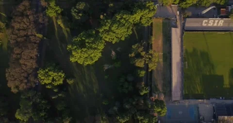 Cityscape Glide: A Drone's View of Mendoza Park Stock Footage 274364223
