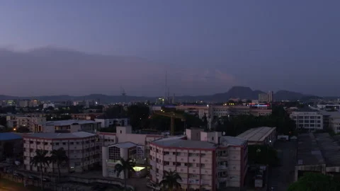 Cityscape Glows Rooftop View Elevated - Ungraded Stock Footage 322540644