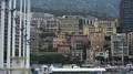 Cityscape of Monaco with active traffic and many high-rise apartment buildings 4k or 4k+ Resolution
