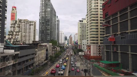 Cityscape motion view from the window of a passing BTS Skytrain of skyscrapers Stock Footage 254577321