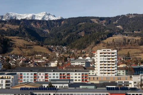 Cityscape with mountains in the background. Stock Photos