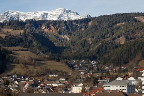 Cityscape with mountains in the background. Stock Photos