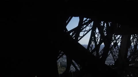 Cityscape from moving elevator of Eiffel Tower Stock Footage 97089053