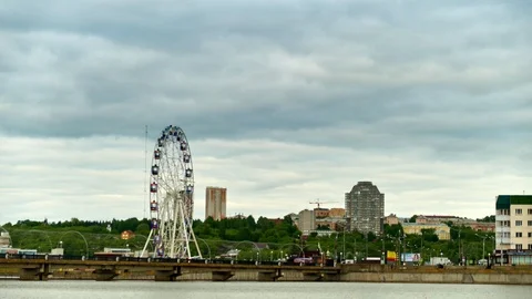 Cityscape with a river in the summer at sunset. Time laps Stock Footage 110859522
