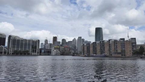 A cityscape on a riverside with beautiful clouds in the sky. Stock Footage 109350288