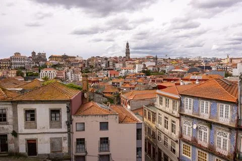 Cityscape with rooftops and typical facade houses in the city of Porto, Portugal Stock Photos