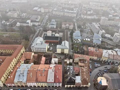 Cityscape With Rooftops, Overhead Vantage Captures Busy Markets With Winding Stock Photos