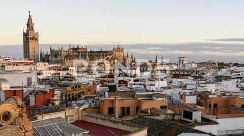Cityscape of Seville with the Seville Cathedral in the skyline Stock Photos