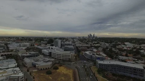 Cityscape storm clouds Perth Australia flyby aerial footage afternoon Stock Footage 102848986
