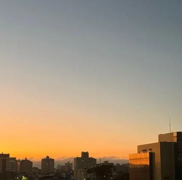 Cityscape at sunset Stock Photos