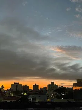 Cityscape at twilight with clouds Stock Photos