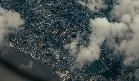 Cityscape under clouds Stock Photos