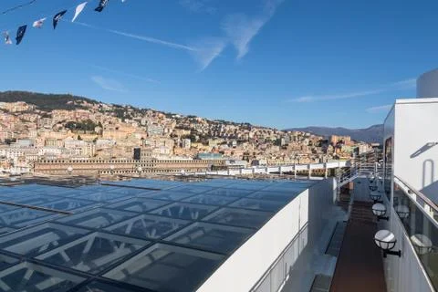 Cityscape view of Genoa from upper deck of cruise liner Stock Photos