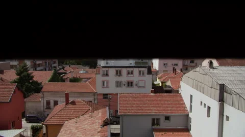 Cityscape view through window blinds Stock Footage 270063817