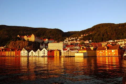 Cityscape view under the sunset light with the river in the foreground, Bergen, Stock Photos