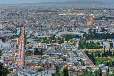 Cityscape, viewed from the upper point in evening, Shiraz, Iran. Stock Photos