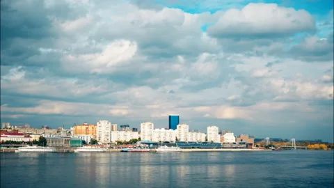 Cityscape from the waterfront, sky with clouds, timelapse Stock Footage 116668420