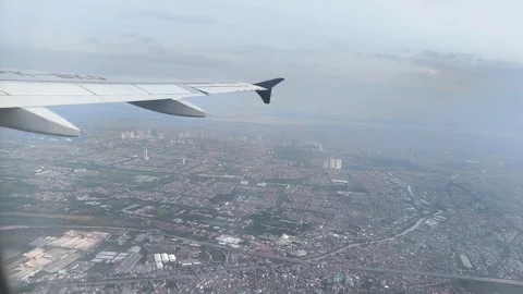 Cityscape from a window airplane Stock Footage 336675050
