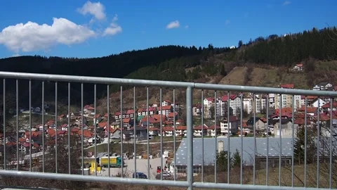 Cityscape from window of moving car, multi-storey apartment buildings, private Stockbeeldmateriaal 345126014