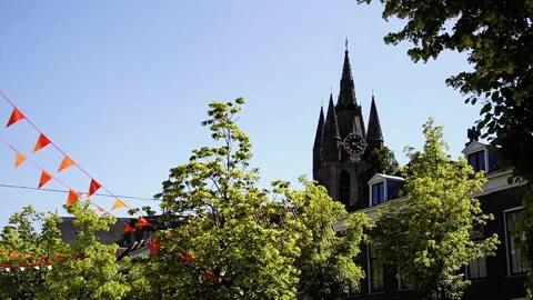 Cityview of Delft with the leaning 75-meter brick tower of Oude Kerk in Holland Stock Footage 284544088
