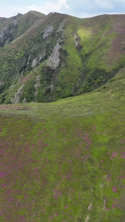 Ciucas Mountains hikers at summit saddle aerial view in Romania Stock Footage 337111058