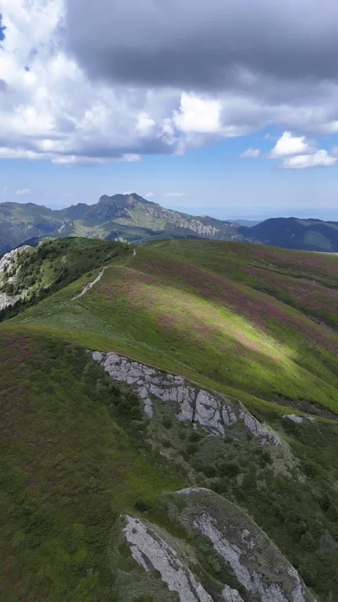 Ciucas Mountains ridge above deep valley aerial view in Romania Stock Footage 337111043