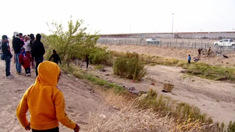 Ciudad Juarez, Mexico - 04/30/2024: Divided Dreams: Migrants at US-Mexico Stock Footage 276720085