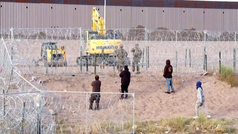 Ciudad Juarez, Mexico - 04/30/2024: Through the Barrier: Migrant Men Speak Stock Footage 276720090
