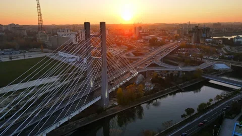 Ciurel passage, bridge over a river with moving cars, field and TV tower near Stock Footage 148737233