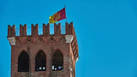 Civic Tower with red yellow flag on Piazza Garibaldi in Bassano del Grappa, V Stock Footage 116255206