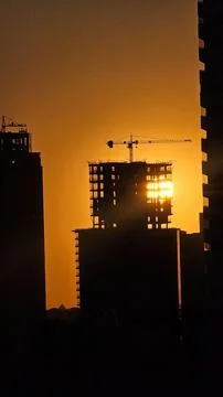 Civil Construction: building under construction with sunrise. Stock Photos