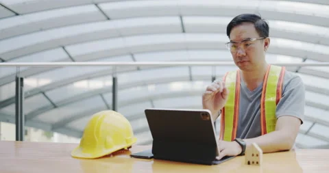 Civil construction engineer checking structure with tablet to check building Stock Footage 164982396