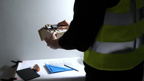 Civil Engineer architect measuring a model house Stock-Footage 258423608