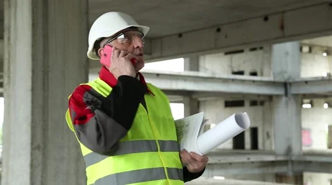 Civil engineer with cell phone at construction site Stock Footage 50600366