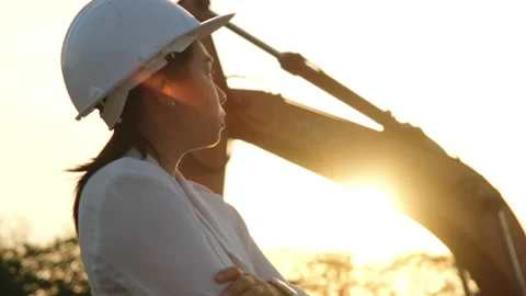 Civil engineer checking after work on construction site during sunset Stock Footage 229706831