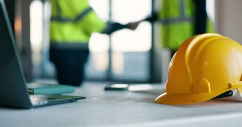 Civil engineer, handshake and helmet on table in office, teamwork or approval Stock Footage 340773306