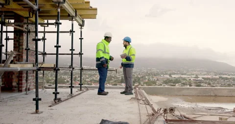 Civil engineer, handshake and men with tablet on construction site, team and Stock Footage 337629486