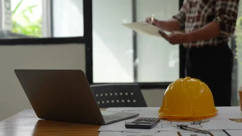 Civil Engineer or architect calculator and working with blueprint. Construction Stock Footage 252186497