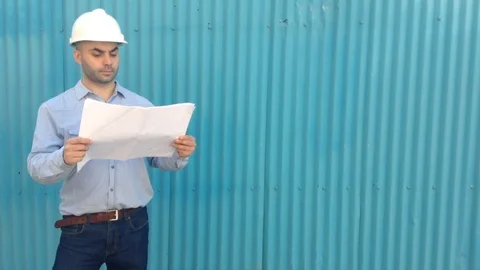 Civil engineer review the plan Stock Footage 119992767